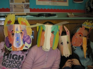 Students wear manila folder masks