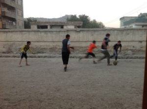 A Road in Kabul with boys playing