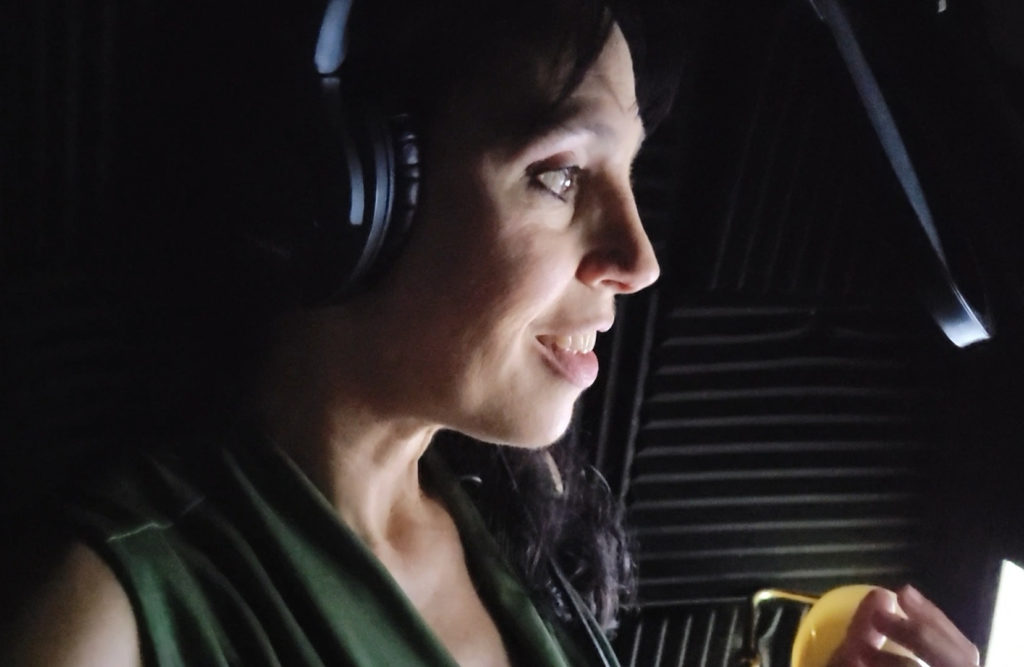 Holly Adams records for an e-learning voice acting project